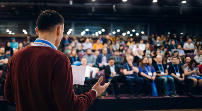 Speaker at business conference and presentation. Audience at the